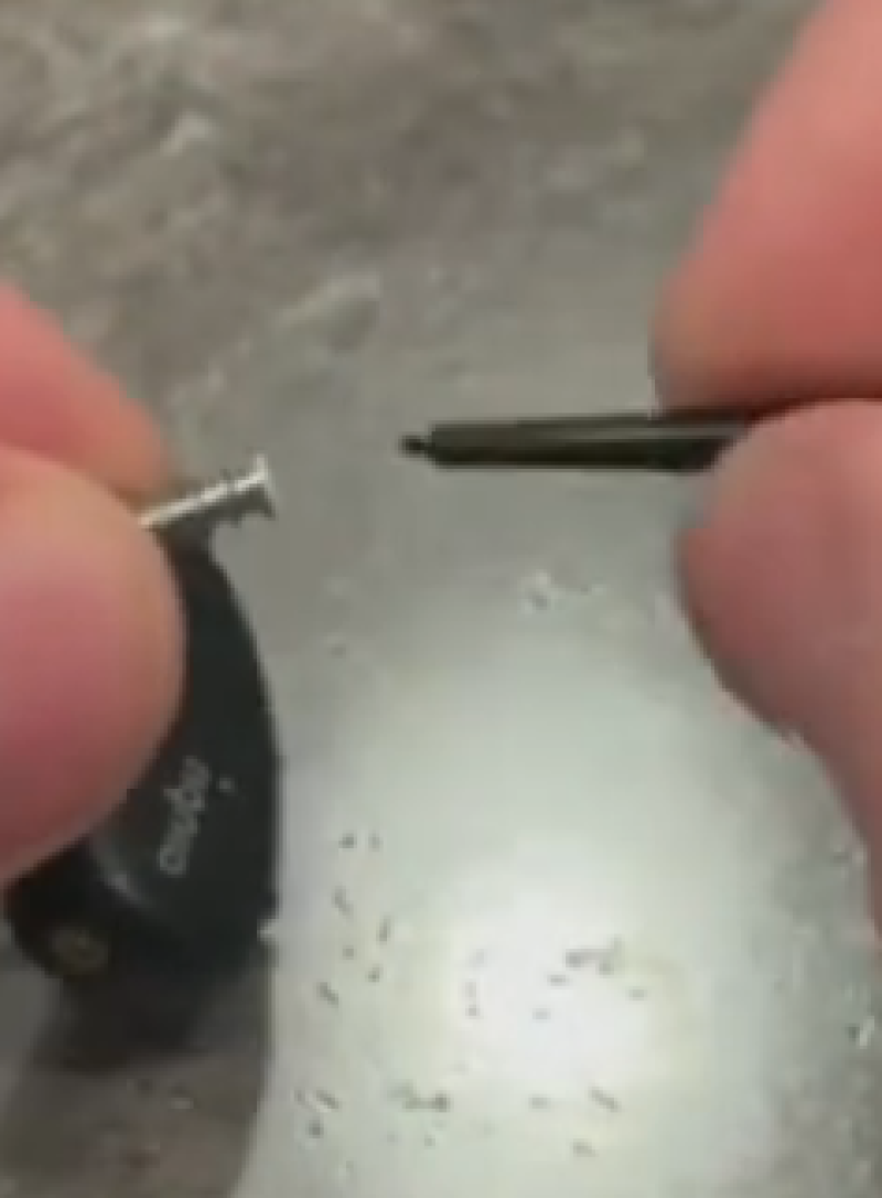 Removing old Signia Wax Guard Filter with Replacement Stick